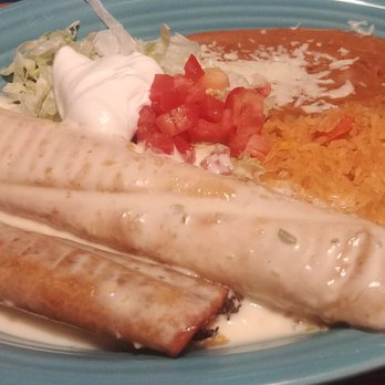 El Loro Mexican Restaurant - Flauta and Chimichanga with rice and beans - Mexican Near Me - Burnsville, Minnesota El Loro Mexican Restaurant - Flauta and Chimichanga with rice and beans - Mexican Near Me - Burnsville, Minnesota