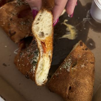 Fernanda's Grill & Pizzaria - Stromboli. That's not even the end portion of the Stromboli. - New American Near Me - Thomson, Georgia
