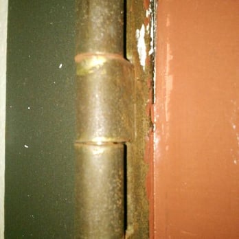 Super 8 by Wyndham Litchfield - Rusted door hinges. - Hotels Near Me - Litchfield, Illinois