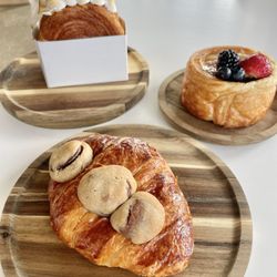 Sunday Press - Clockwise from bottom ($9 each): Le crookie (cookie croissant), lemon blueberry croissant swirl, creme brûlée croissant swirl