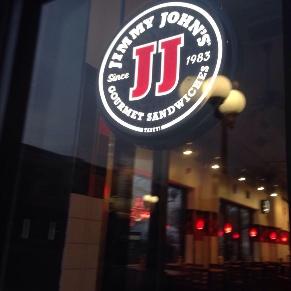 a reflection in the window of a restaurant