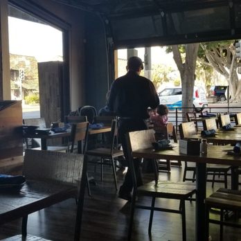 Cicciotti's - Interior. The walls roll up ( garage style) and it gets breezy and chilly - Italian Near Me - Carlsbad, California