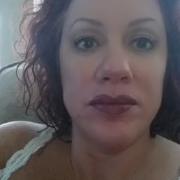 Lip touch up with a new color. Lip touch up with a new color.