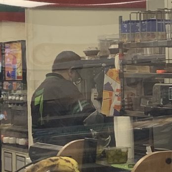 7-Eleven - a man working in a grocery store - Gas Stations Near Me - Aldie, Virginia 7-Eleven - a man working in a grocery store - Gas Stations Near Me - Aldie, Virginia