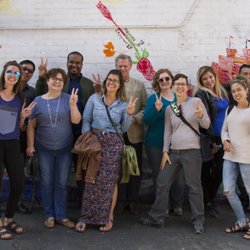 Chinese Culture Center: Chinatown Walking Tour - In front of a mural the Culture Center created with local youth.