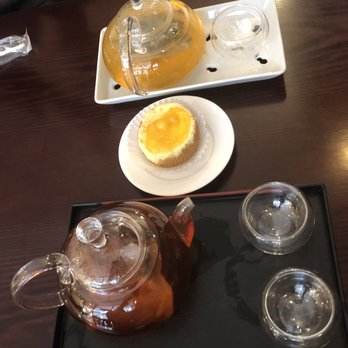 Silk Road Cafe - Top: Cinnamon Pineapple,  Middle: Pineapple cheesecake,  Bottom: Dried Passion Fruit, All delicious! - Coffee & Tea Near Me - New York, New York