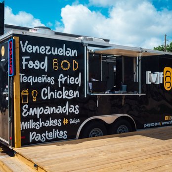 Vfingers - a food truck parked in front of a building - Venezuelan Near Me - Katy, Texas