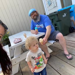 Baby's first ice cream! Out on their patio eating area