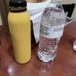 Hyderabad House - MANGO LASSI and water. Both were bottled.