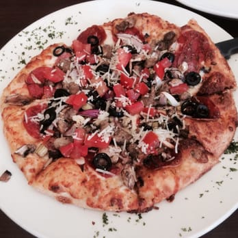 Strings Italian Cafe - Combo pizza with great crust - Italian Near Me - Yreka, California