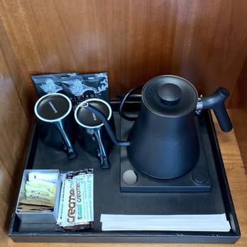 Thompson Seattle - Coffee service set in room wardrobe - Hotels Near Me - Seattle, Washington Thompson Seattle - Coffee service set in room wardrobe - Hotels Near Me - Seattle, Washington