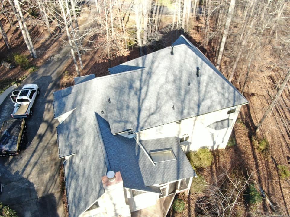 Slide of AMI Roofing