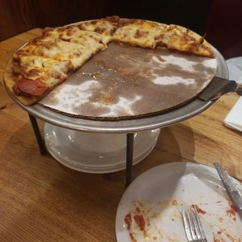 Giordano's - Half eaten gluten free pizza. Yum! - Pizza Near Me - Chicago, Illinois Giordano's - Half eaten gluten free pizza. Yum! - Pizza Near Me - Chicago, Illinois