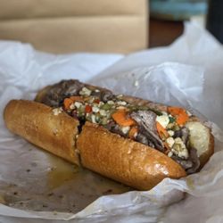 A Cut Above Butcher Shop - The Italian Beef Sandwich (jus not pictured). Super juicy and flavorful! @bilalandjesseatfood