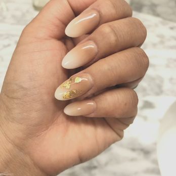 Daisy Nails - They look nice but you can see some dark spots on the gold flakes. - Nail Salons Near Me - Lancaster, California Daisy Nails - They look nice but you can see some dark spots on the gold flakes. - Nail Salons Near Me - Lancaster, California