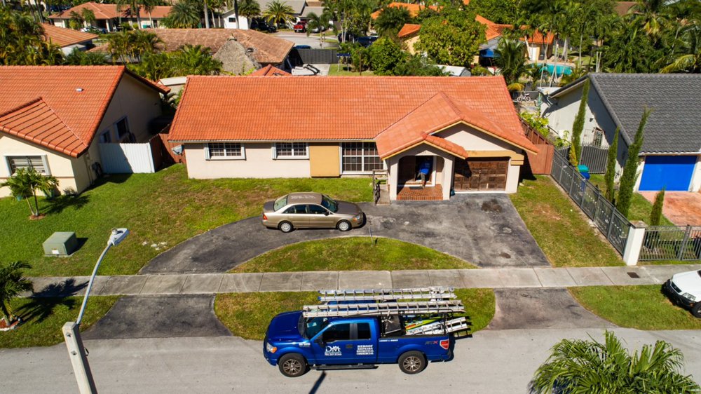 Slide of DM Roofing Company