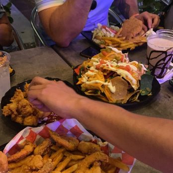 RockHouse LIVE - a table full of food - American Near Me - Clearwater, Florida RockHouse LIVE - a table full of food - American Near Me - Clearwater, Florida