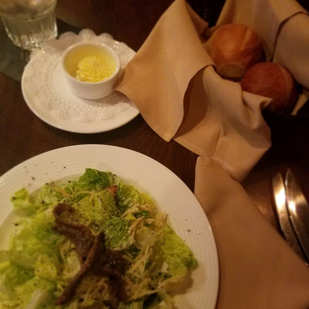 Buckhead's - Caesar salad with anchovies tasteless bread and butter - Steakhouses Near Me - Richmond, Virginia Buckhead's - Caesar salad with anchovies tasteless bread and butter - Steakhouses Near Me - Richmond, Virginia