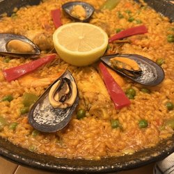 Paella with seafood and chicken