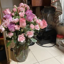 Henry's Flowers - $120 subtract the $30 for express delivery and came w/ the vase. Pretty but some flowers look a little old.