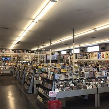 Rhino Records - Inside Rhino Records. Photograph taken at Entrance looking in. Vinyl records for sale in the back. - Music & DVDs Near Me - Montclair, California Rhino Records - Inside Rhino Records. Photograph taken at Entrance looking in. Vinyl records for sale in the back. - Music & DVDs Near Me - Montclair, California