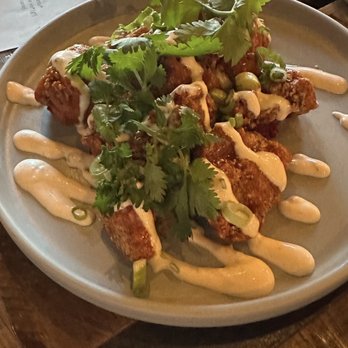The Little Lamb - "Chicken wings" (Gluten Free!! Fried chicken thigh) srirancha, beet kimchi, herb salad - Gastropubs Near Me - Clearwater, Florida