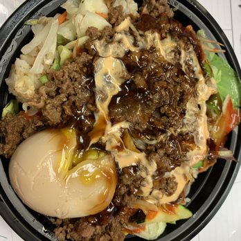 Sistah - Coworkers's Bi Bim Bap. Little spicy -meat on bed of greens & rice. Some bean sprout and cucumber? She said it was very good! - Food Trucks Near Me Sistah - Coworkers's Bi Bim Bap. Little spicy -meat on bed of greens & rice. Some bean sprout and cucumber? She said it was very good! - Food Trucks Near Me