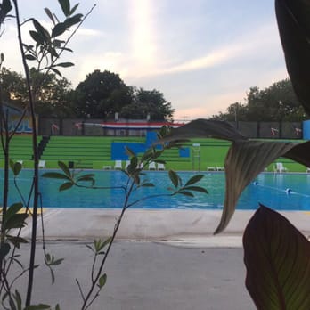 Kosciuszko Pool - Looks pretty clean from afar, and about one person was in the pool on this hot summer day.. (taken at the fence at 8pm) - Swimming Pools Near Me - Brooklyn, New York