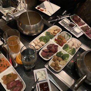 Photo of The Melting Pot - San Antonio, TX, United States. Meat, sauces,  Mojo Bourguignonne