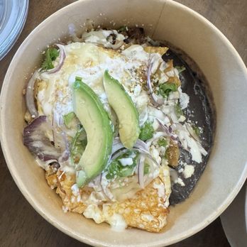 Chilaqueria Monarca - Green chilaquiles with added arrachera and eggs. - Mexican Near Me - El Paso, Texas Chilaqueria Monarca - Green chilaquiles with added arrachera and eggs. - Mexican Near Me - El Paso, Texas