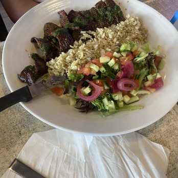 Anna Maria Oyster Bar - Pier - Skirt steak with cilantro rice and salad. - Seafood Near Me - Bradenton Beach, Florida Anna Maria Oyster Bar - Pier - Skirt steak with cilantro rice and salad. - Seafood Near Me - Bradenton Beach, Florida