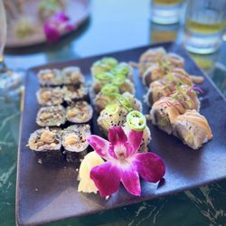 Ichimaru My Fav - Three rolls ordered. Crunchy salmon skin, spicy hamachi and wahoo.