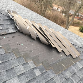 AA Home Inspection - Shingle peeling from roof due to wind exposure. - Home Inspectors Near Me - Union, Kentucky AA Home Inspection - Shingle peeling from roof due to wind exposure. - Home Inspectors Near Me - Union, Kentucky