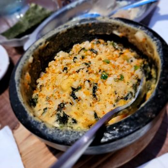 ARIARI - Dolsot Al-Bap post mixing. Lacked sea urchin flavor but the flavors of the roe and rice were delicious. Rich - Korean Near Me - New York, New York