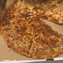 Jungle Gym’s Indoor Play Center & Cafe - How we first received our order: missing toppings on one half, no big deal, we will take it back and get another one.