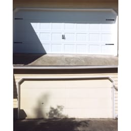 Old/Broken/rusted out garage door paint fading and scraping off. Upgraded to a BEAUTIFUL, insulated sturdy garage door. Makes a difference! Old/Broken/rusted out garage door paint fading and scraping off. Upgraded to a BEAUTIFUL, insulated sturdy garage door. Makes a difference!