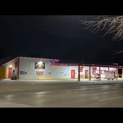 Duck king convenient - Nightime store front