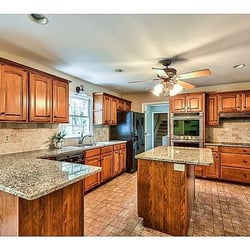 Southern Home Redesign, LLC - After staging, SHR helped choose wall color and granite to create a bright, clean, modern kitchen.