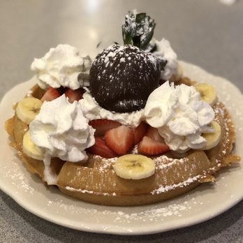 Demitasse Cafe - a waffle with strawberries, bananas, and whipped cream - Breakfast & Brunch Near Me - Chicago, Illinois Demitasse Cafe - a waffle with strawberries, bananas, and whipped cream - Breakfast & Brunch Near Me - Chicago, Illinois