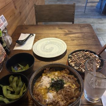 Yoshiya Kitchen - L to Right: Edamame, Japanese Beef Udon with Eggs, Okonomiyaki - Ramen Near Me - Henderson, Nevada Yoshiya Kitchen - L to Right: Edamame, Japanese Beef Udon with Eggs, Okonomiyaki - Ramen Near Me - Henderson, Nevada