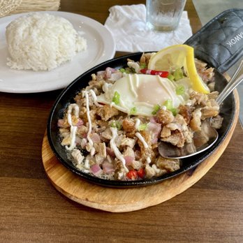Kain Tayo - Sizzling sissig - Pan Asian Near Me - St. Louis, Missouri Kain Tayo - Sizzling sissig - Pan Asian Near Me - St. Louis, Missouri