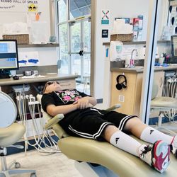 Kids Care Dental & Orthodontics - Vacaville - Watching a movie during dental visit