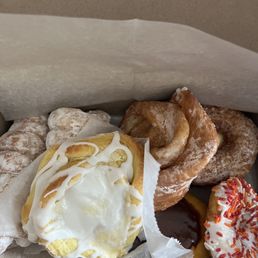 a variety of donuts in a box a variety of donuts in a box