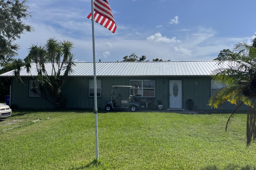 Slide of The Roof Genie