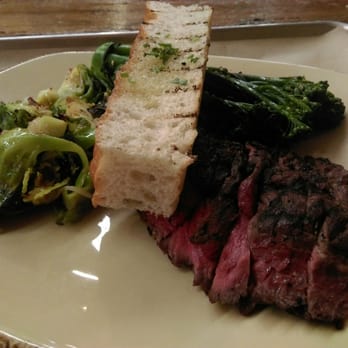 Urban Plates - Steak plate with broccolini & brussels sprouts with bacon. And a piece if foccacia bread. - New American Near Me - Dublin, California Urban Plates - Steak plate with broccolini & brussels sprouts with bacon. And a piece if foccacia bread. - New American Near Me - Dublin, California