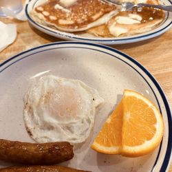 Eddie's Restaurant - Egg, sausage & pancakes combo.
