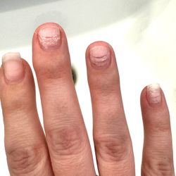 July Nails & Spa - My natural nails shredded off by a metro card at this salon! Do not support this "salon"!