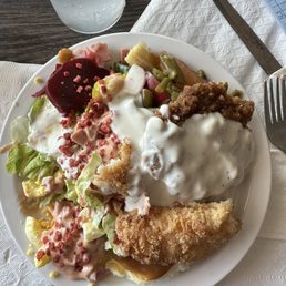 My salad bar trip. I topped it off with catfish, chicken fried steak and mash potatoes. There is a great salad under there somewhere. My salad bar trip. I topped it off with catfish, chicken fried steak and mash potatoes. There is a great salad under there somewhere.