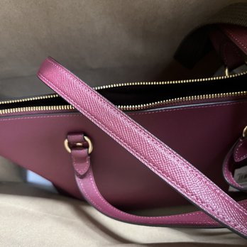 Coach - My wine colored handbag hiding - Outlet Stores Near Me - Ontario, California