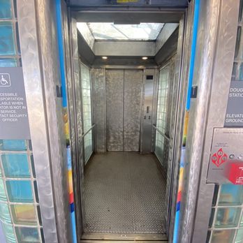 Douglas Road Station - All glass Schindler HXpress elevator, Douglas Road Station - Metro Stations Near Me - Miami, Florida
